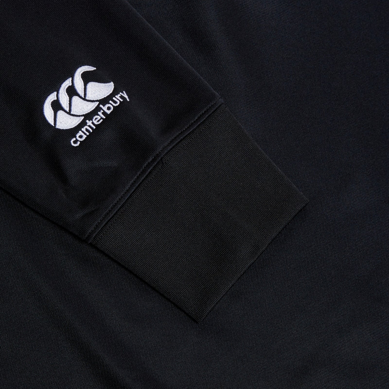 Detailed image of the Canterbury logo on the sleeve of the Birr RFC CCC Training Hood, showcasing the quality craftsmanship for fans of Birr Rugby.